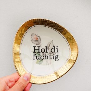 Wandteller Hol di fuchtig Typo Herr Fuchs 15cm Blumen Muster plattdeutsch Gold eckig